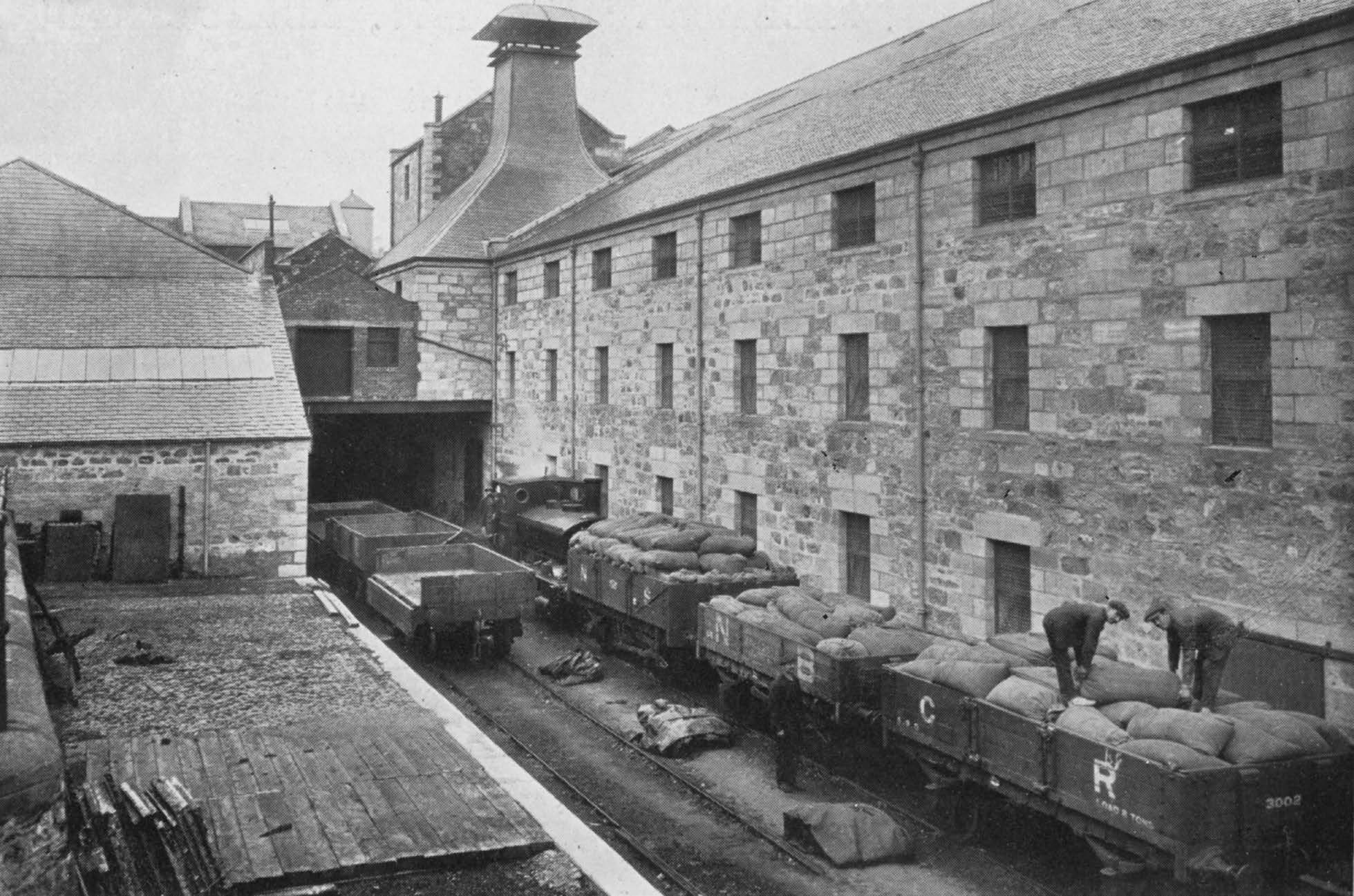 Dailuaine : Taking delivery of barley at siding at maltings.